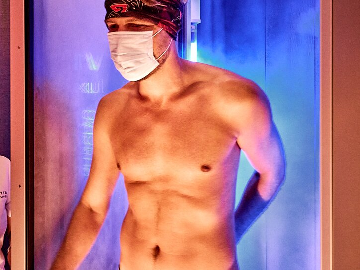 A man is just coming out of a cryo chamber